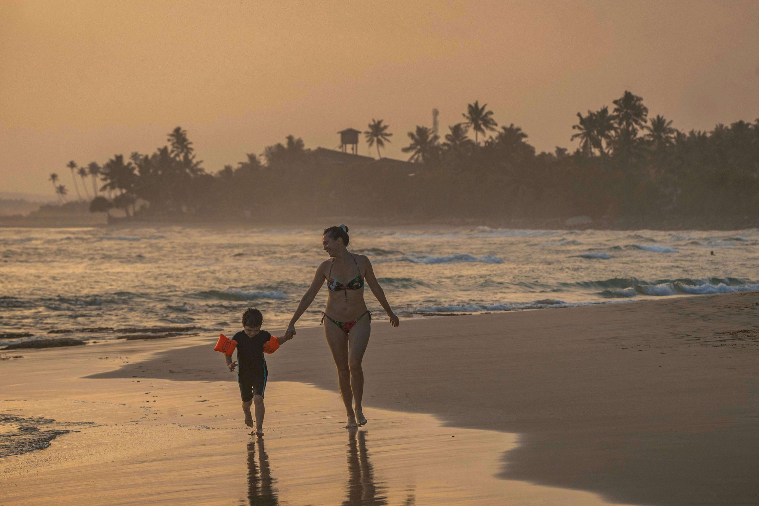 tourist in sri lanka beach